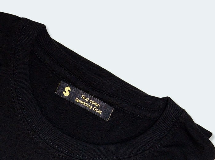 ejemplo de un a etiqueta cosida en una camiseta roly Ejemplo De Un A Etiqueta Cosida En Una Camiseta Roly